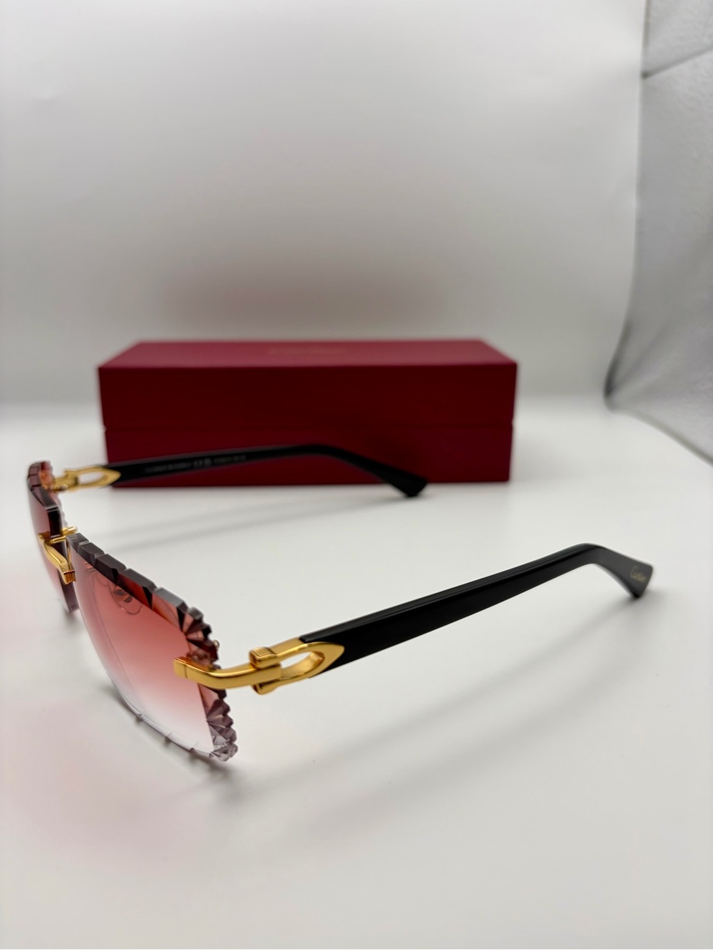 Cartier Men’s Rimless Gradient Red Sunglasses with Gold Accents - Picture 3 of 7